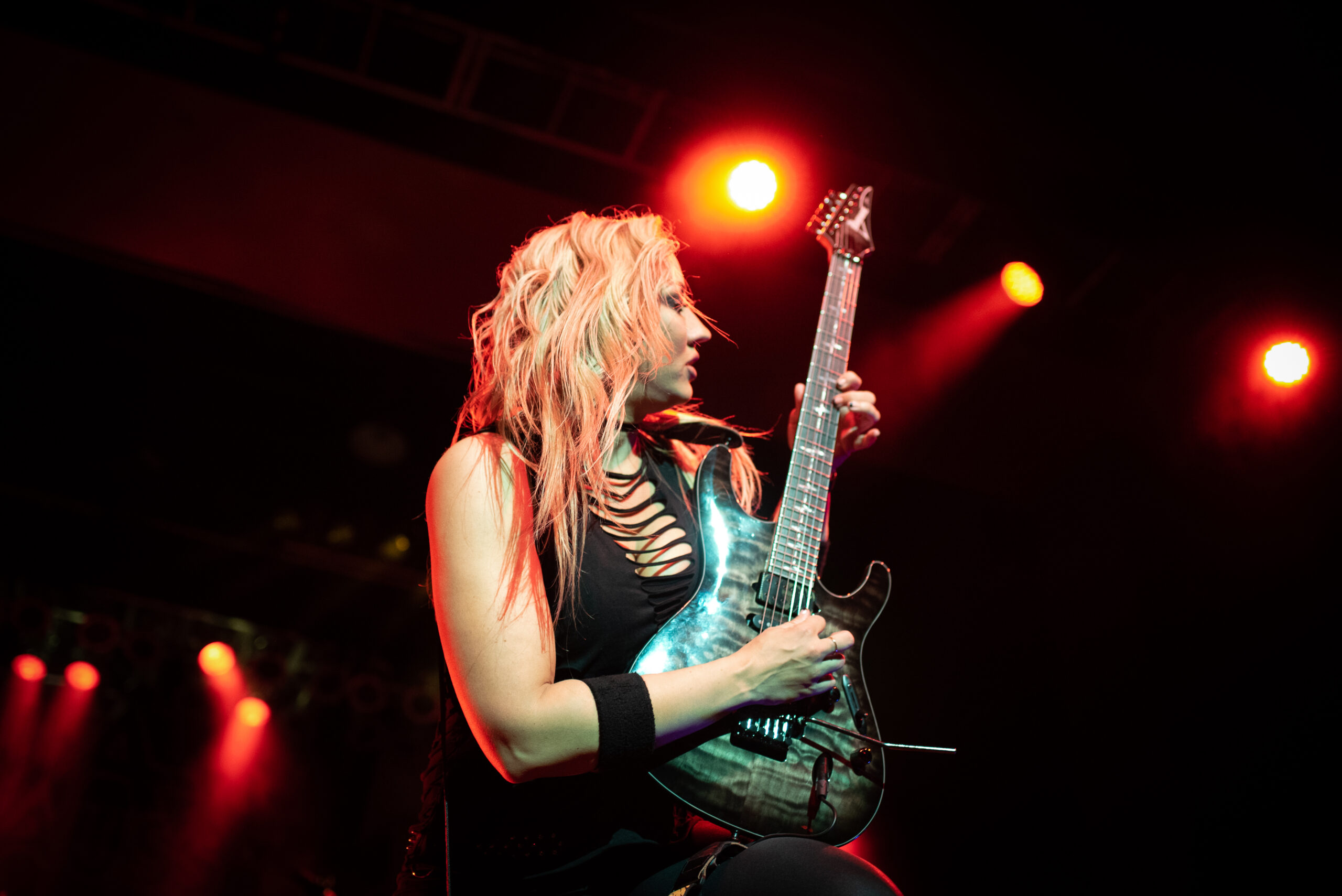 Guitarist Nita Straus live on stage in Michigan.