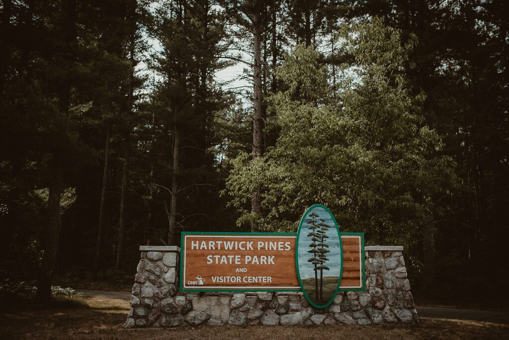 Hartwick Pines State Park sing at entrance of the park.