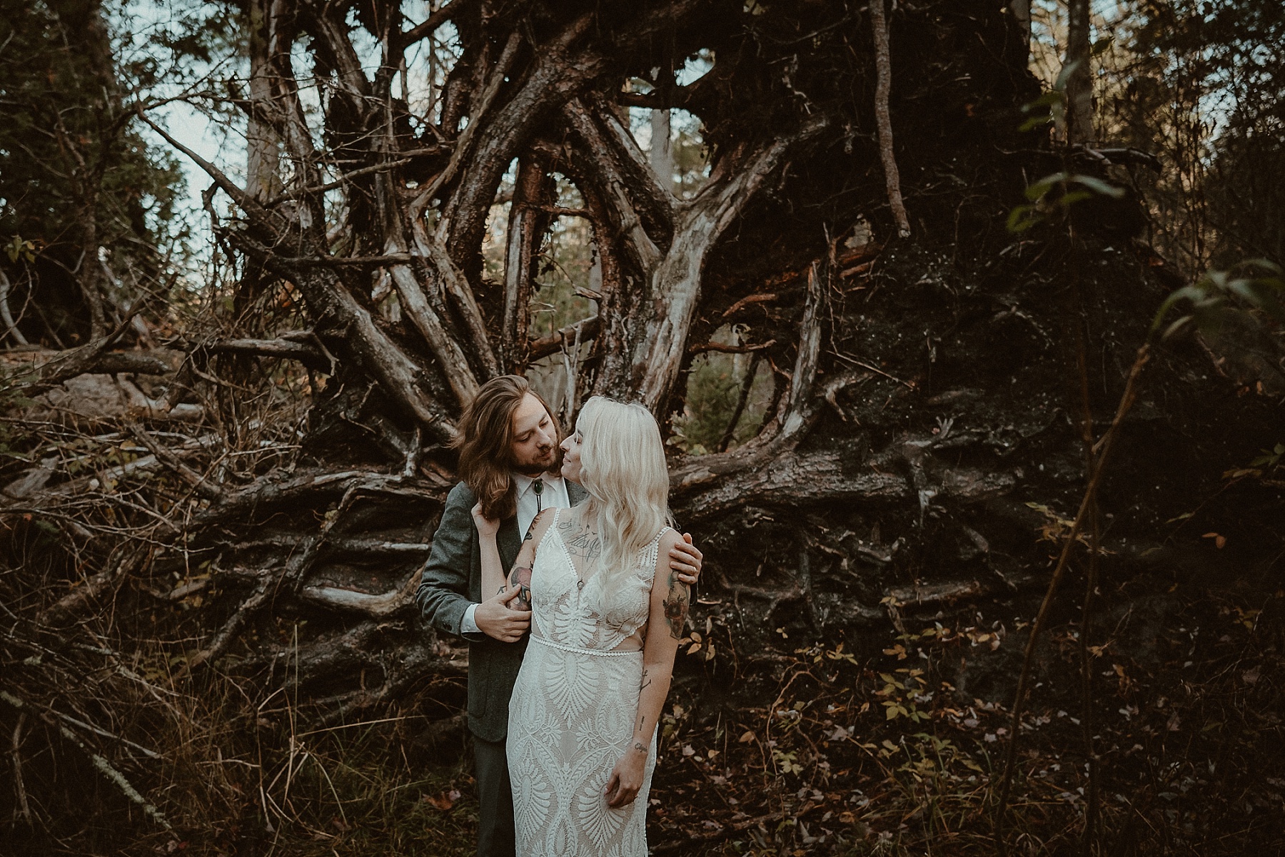 Michigan elopement couple in northern woods near Grayling photographed by Shonda M Photography.