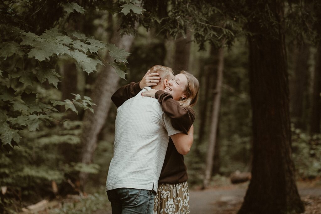 Couple hugging after proposed to her.