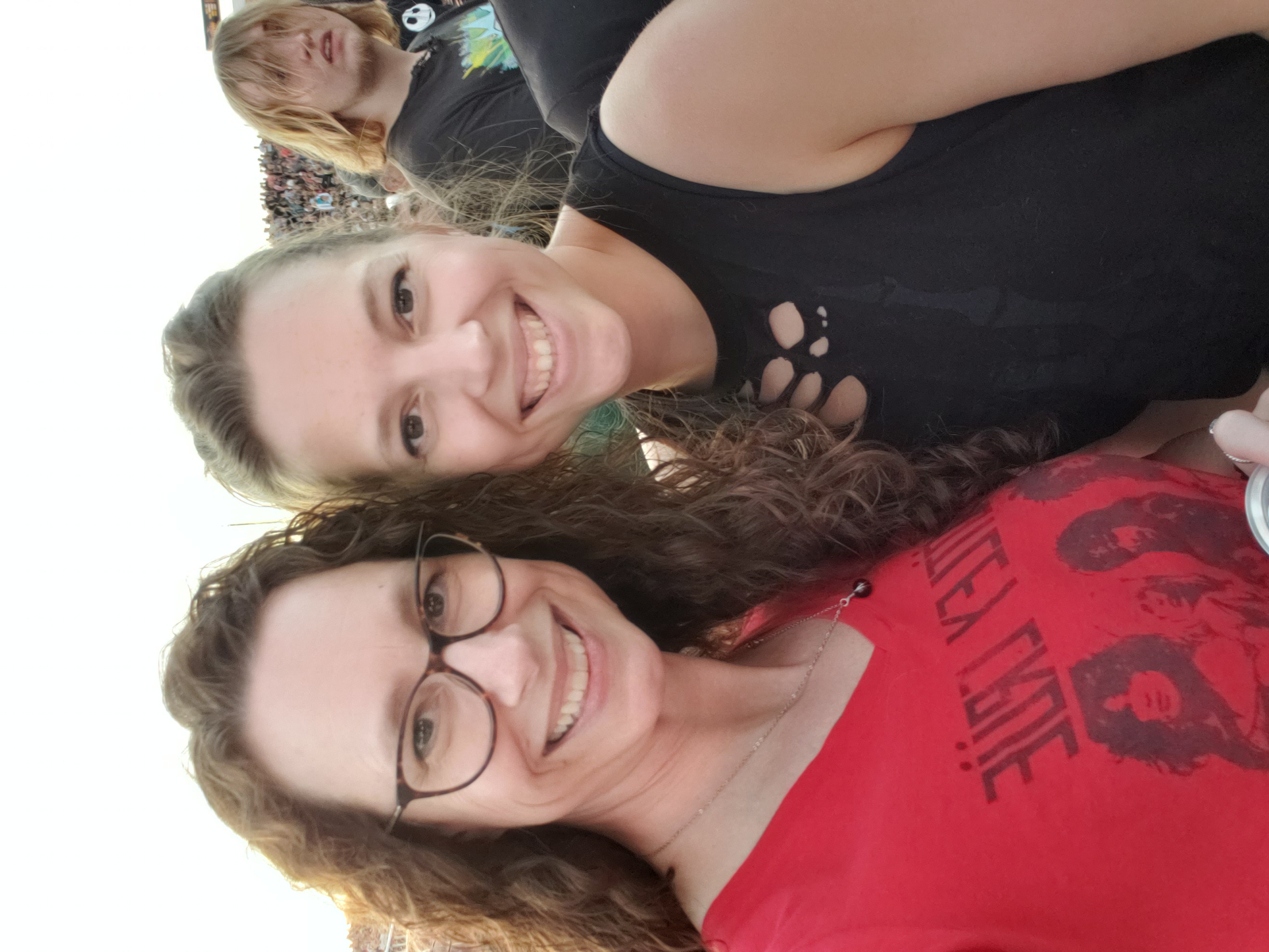 Photographer Shonda and her daughter at a rock concert.